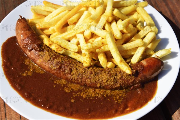 Currywurst with French fries