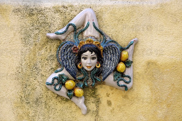 Trinacria on a wall