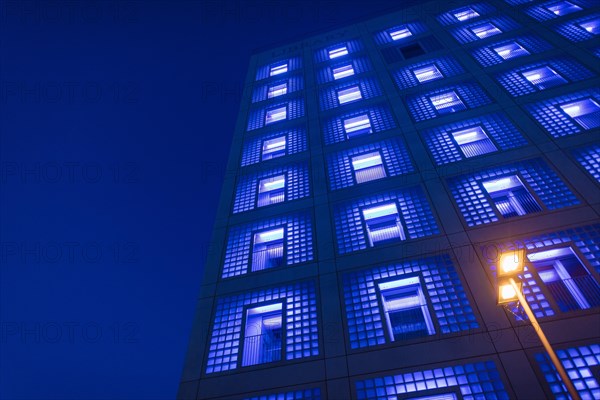 Illuminated city library at night