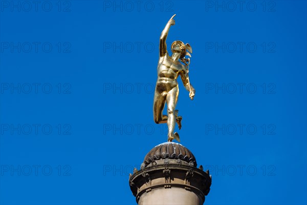 Golden statue of the god Mercury