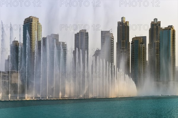 Fountains in front of skyscrapers