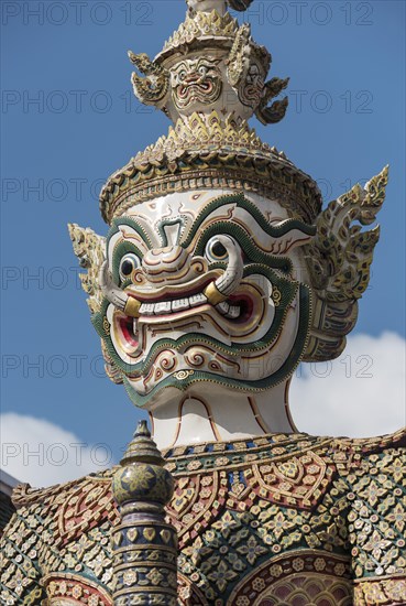 Statue of giant Yaksha demon guarding gates