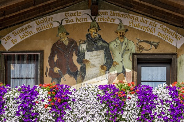 Farmhouse gable with Luftlmalerei wall paintings and floral decoration