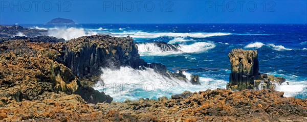 Coast with basalt cliffs