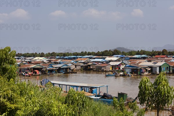 Floating villages with stilt houses