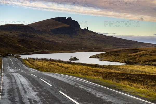 Rocks Old Man of Storr with street and Loch Leathan in the foreground