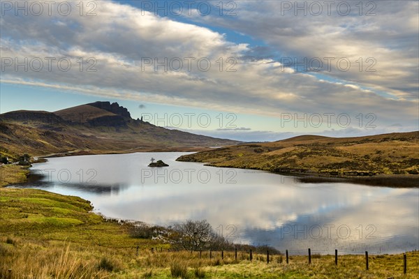 Rock Old Man of Storr with Loch Leathan in the foreground