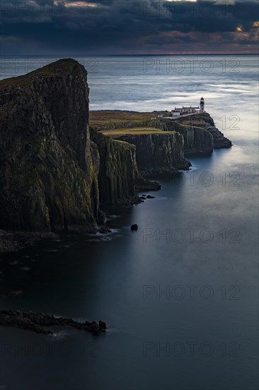 West coast Isle of Sky with North Sea with lighthouse at blue hour