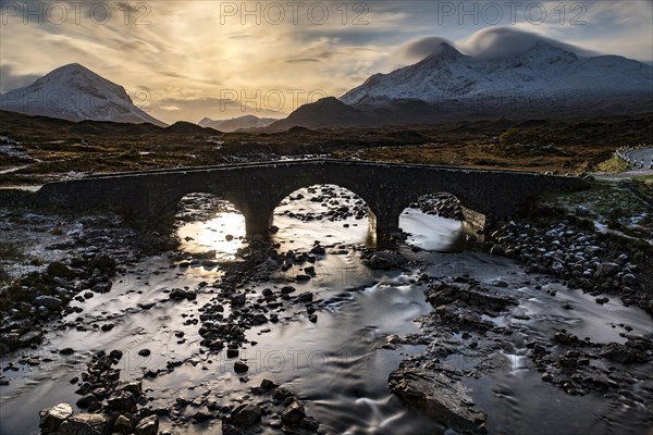 Sligachan Bridge with snow-covered peaks of Marsco and Sgurr Nan Gillean