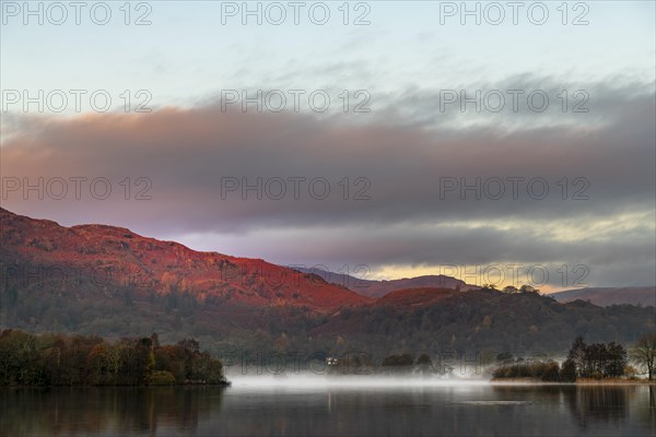 Morning atmosphere and fog over the lake