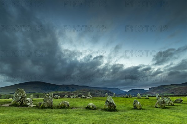 Stone circle with dramatic clouds