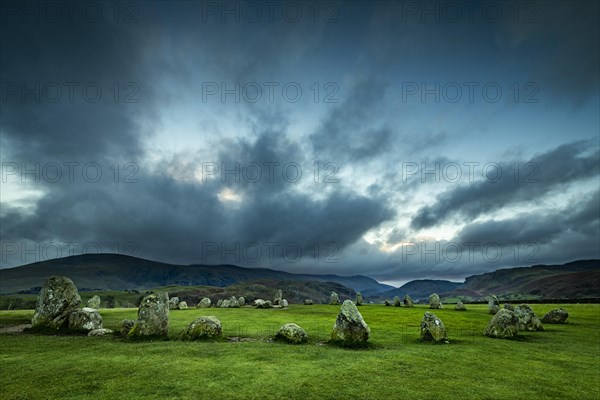 Stone circle with dramatic clouds