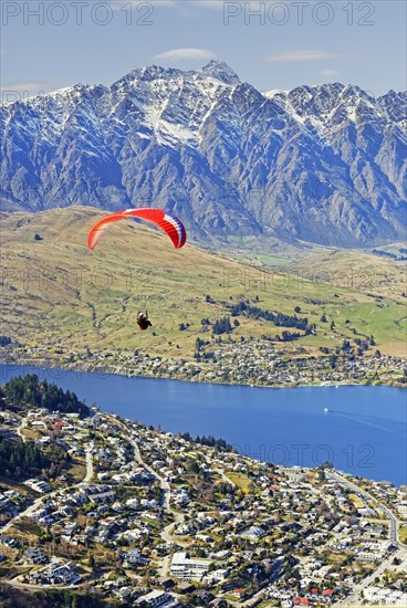 Paraglider over lake Wakatipu and Queenstown