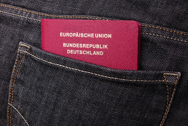 German passport of the European Union in trouser pocket