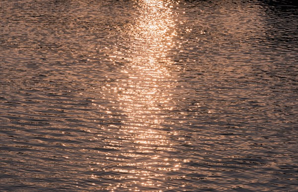 Water reflecting sunset