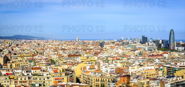 City view with houses and Torre Agbar by architect Jean Nouvel