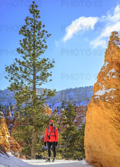 Young woman on a hiking trail