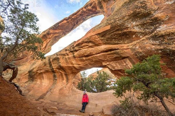 Hiker at Double O Arch