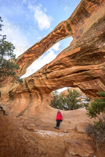 Hiker at Double O Arch