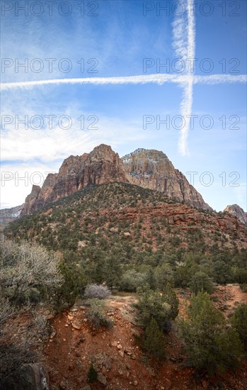 Mountain Bridge Mountain with condensation trails in the sky