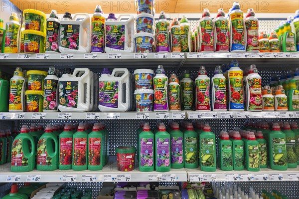 Shelves with flower fertilizer and plant fertilizer in the supermarket