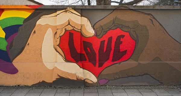Graffiti on wall with lettering Love