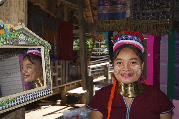 Young woman with neck rings