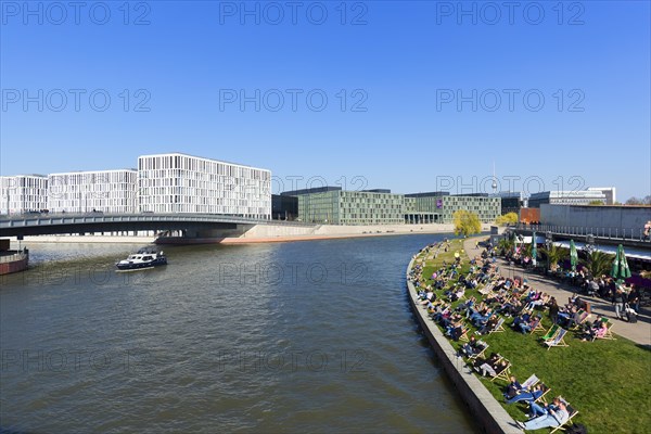 Ludwig Erhard Ufer at the river Spree with deckchairs