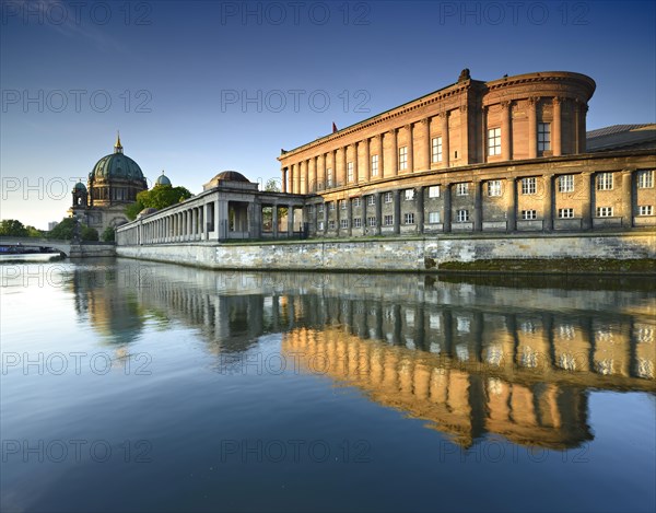 Alte Nationalgalerie and arcades reflecting in the river Spree