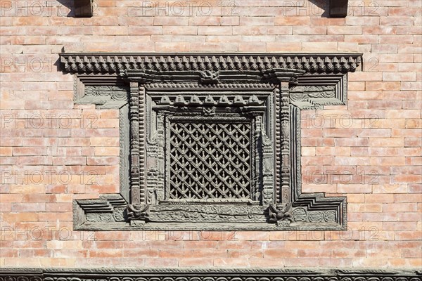 Beautifully carved wooden window at the royal palace Patan Durbar square