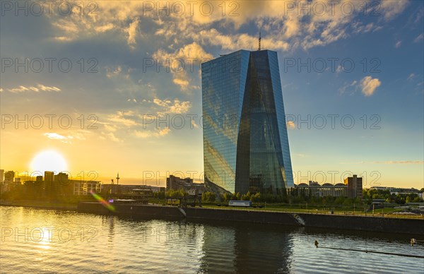 European Central Bank at sunset with skyline