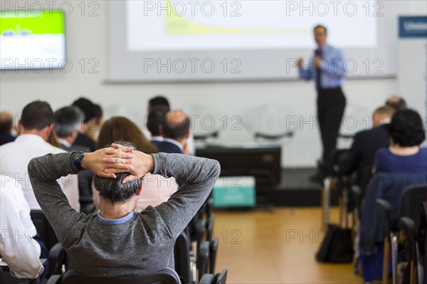 Business man during a conference presentation