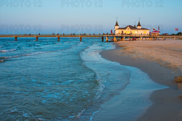 Beach with Ahlbeck pier in evening light