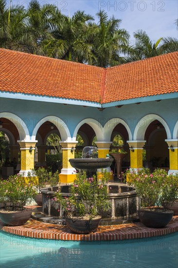 Fountain with pool in center of lobby