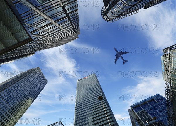 Airplane flying over Canary Wharf