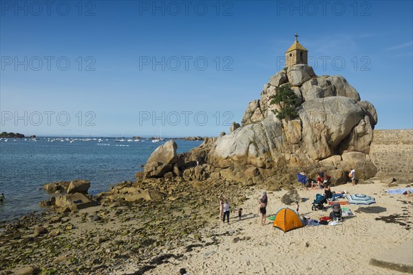 Beach and chapel on rocks, Port Blanc