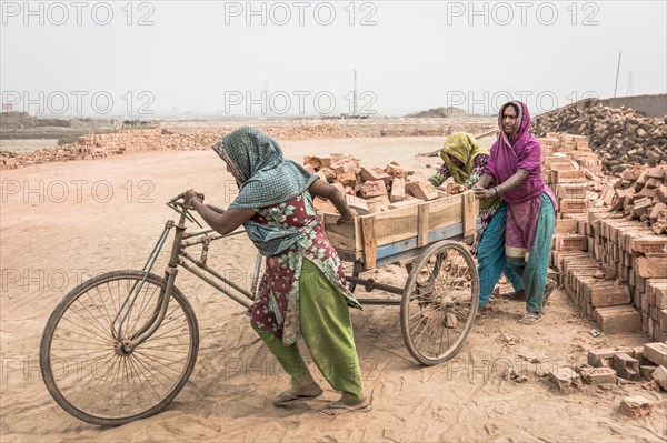 Workers in a brickyard