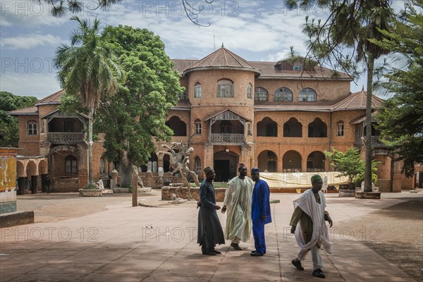 Locals outside Sultan Palace