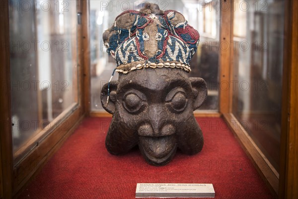 Janus mask decorated with glass and ceramic beads