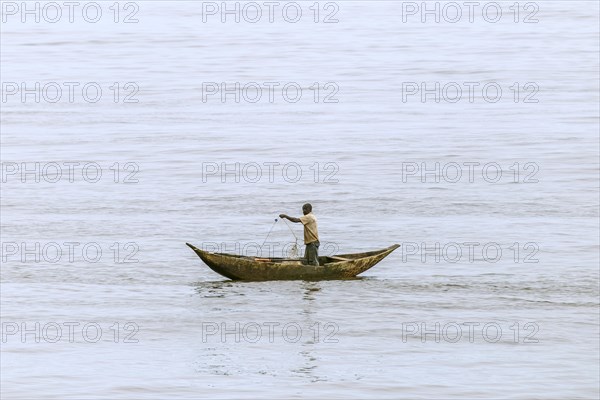 Fisherman in a pirogue