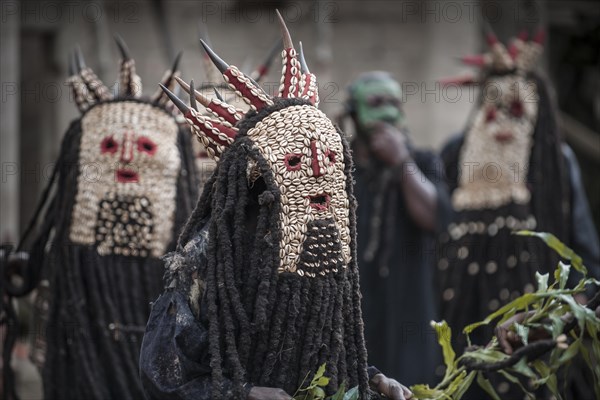 Men of the ethnic group of the Bamileke with traditional masks