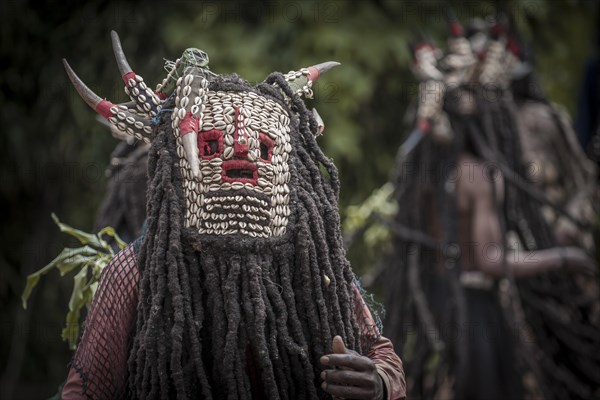 Men of the ethnic group of the Bamileke with traditional masks