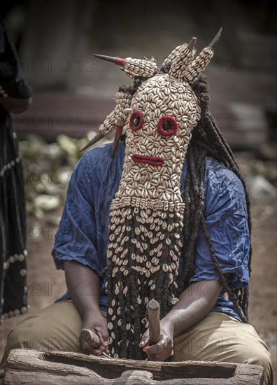 Men of the ethnic group of the Bamileke with traditional masks