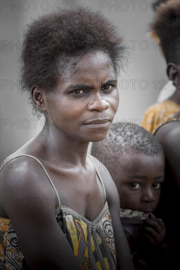 Pygmy woman and child