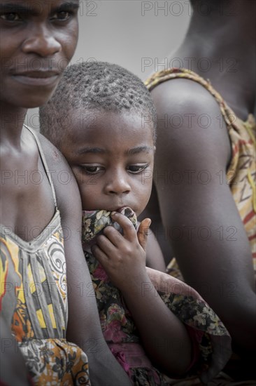 Pygmy woman and child