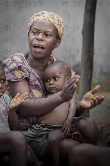 Pygmy woman and child