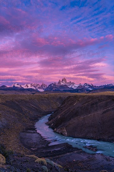 Fitz Roy summit massif with snow at sunrise