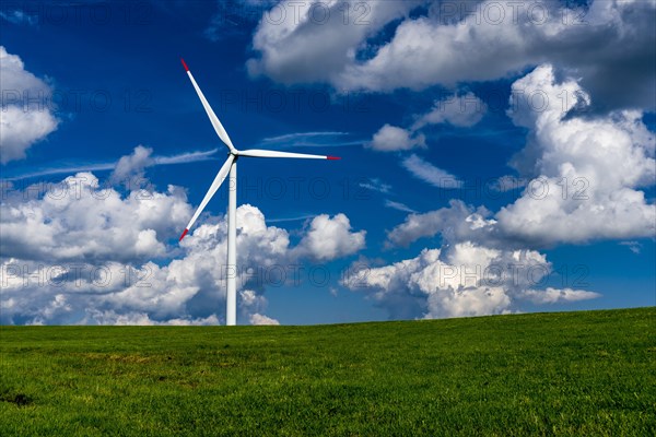 Wind power plant in agricultural landscape