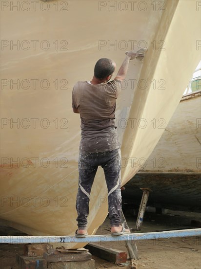 Workers in the shipyard