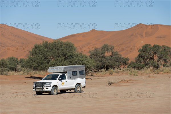 Truck on dirt road in the Namib-Naukluft National Park
